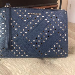 Navy blue Michael Kors wristlet.